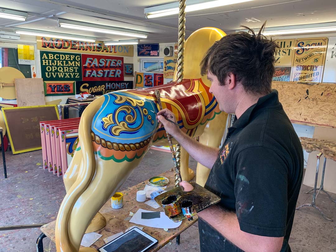 Carter the lion being painted for Lions of Windsor sculpture trail 