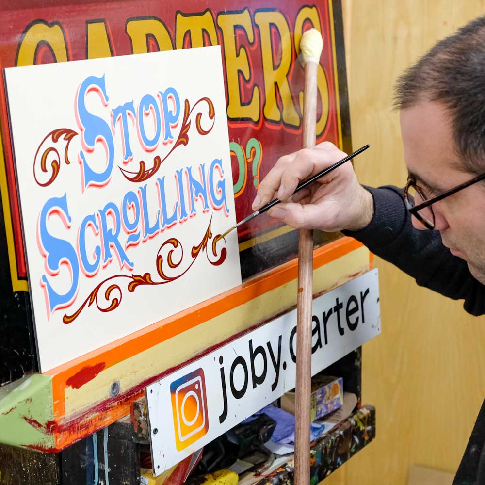 Joby Carter, expert signwriter